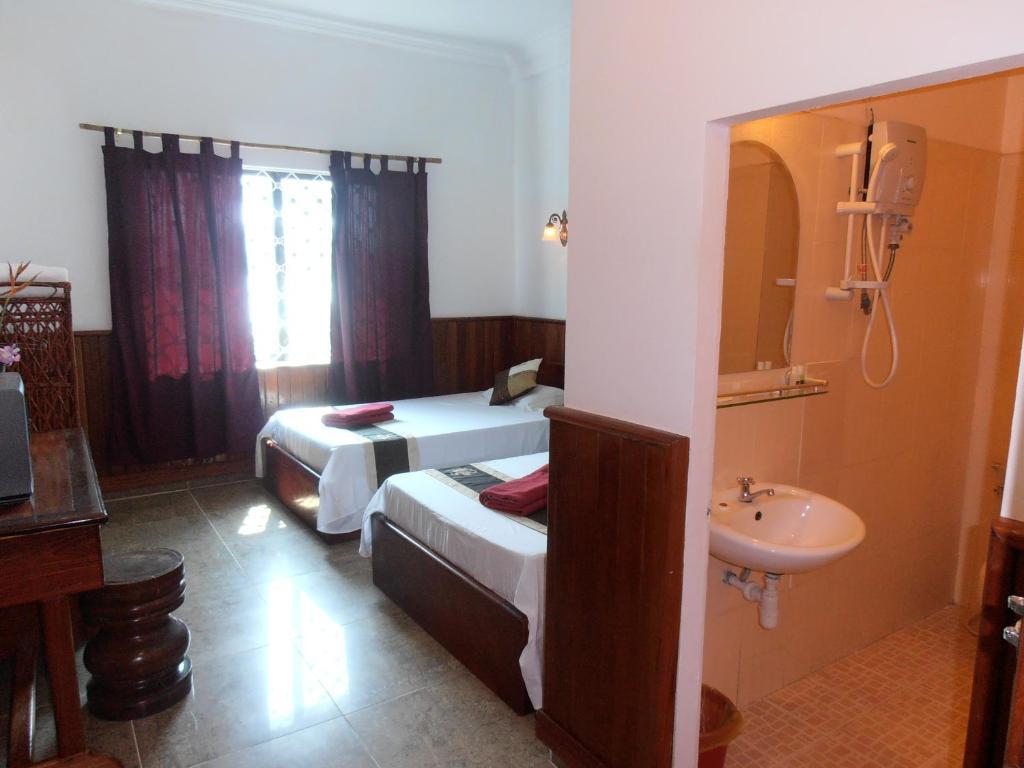 Firefly Guesthouse - The Berlin Angkor Sziemreap Szoba fotó