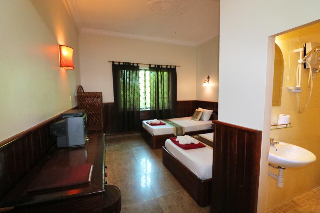 Firefly Guesthouse - The Berlin Angkor Sziemreap Szoba fotó